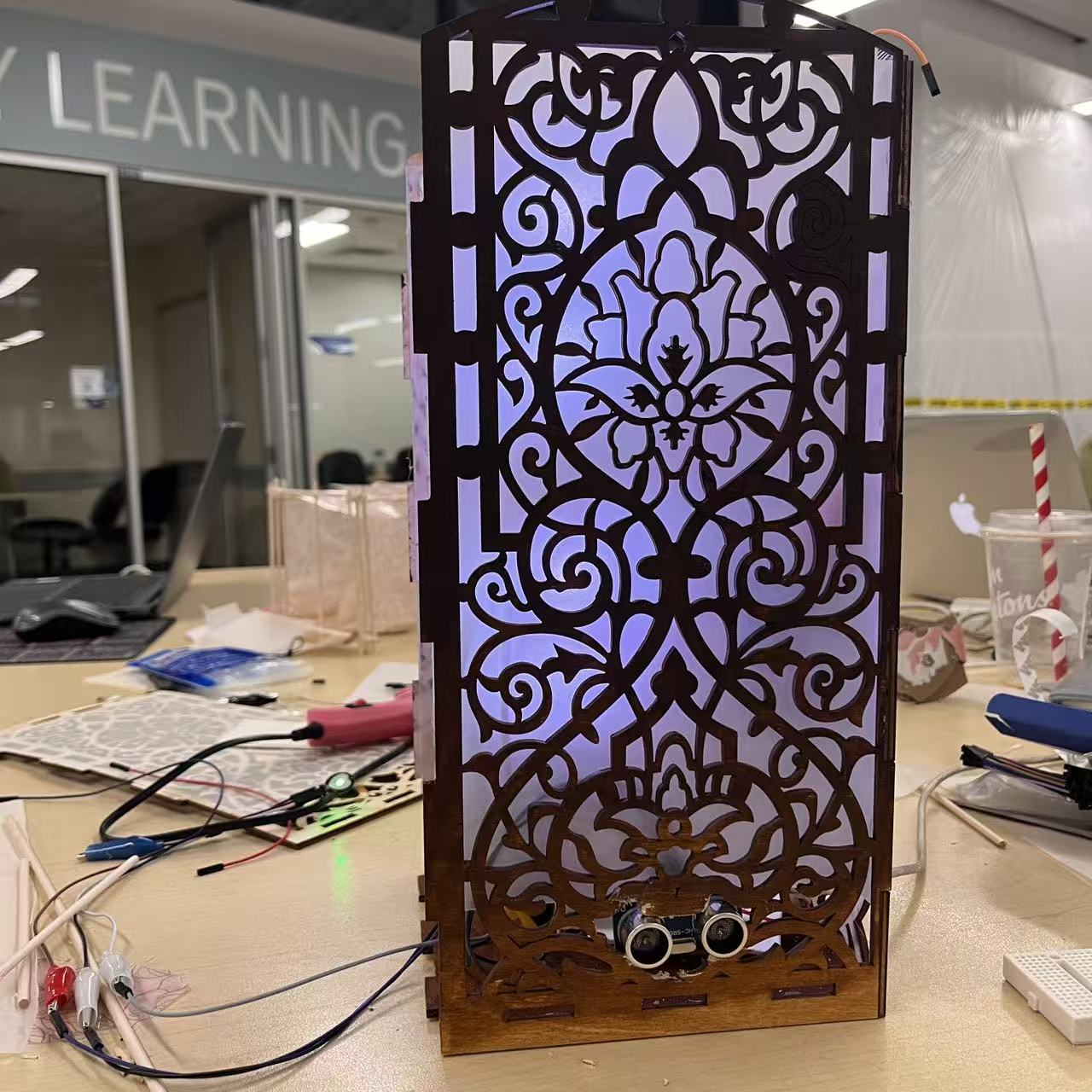 The Emotion Visualization Lamp is an interactive prototype that transforms emotional signals into light-based visual feedback. Building on the earlier version from Project 2, this updated design integrates Arduino sensors, ProtoPie data transmission, and an improved lighting system to create a more responsive and natural emotional interaction.

All sensor inputs are routed into ProtoPie, where predefined rules convert data fluctuations into corresponding color changes. This creates a direct and seamless link between physiological activity and the lamp’s visual output.

For Project 3, a wearable wristband prototype was added to house the heartbeat sensor more comfortably, improving usability and stability. The lighting component was upgraded with a brighter, more diffused LED strip to make the emotional feedback smoother and more immersive. ProtoPie is used to transmit real-time sensor data, enabling clearer visual communication between physical input and digital expression.

This iteration explores how emotional data can be represented in subtle yet meaningful ways, turning physiological signals into a calming and relatable visual experience.